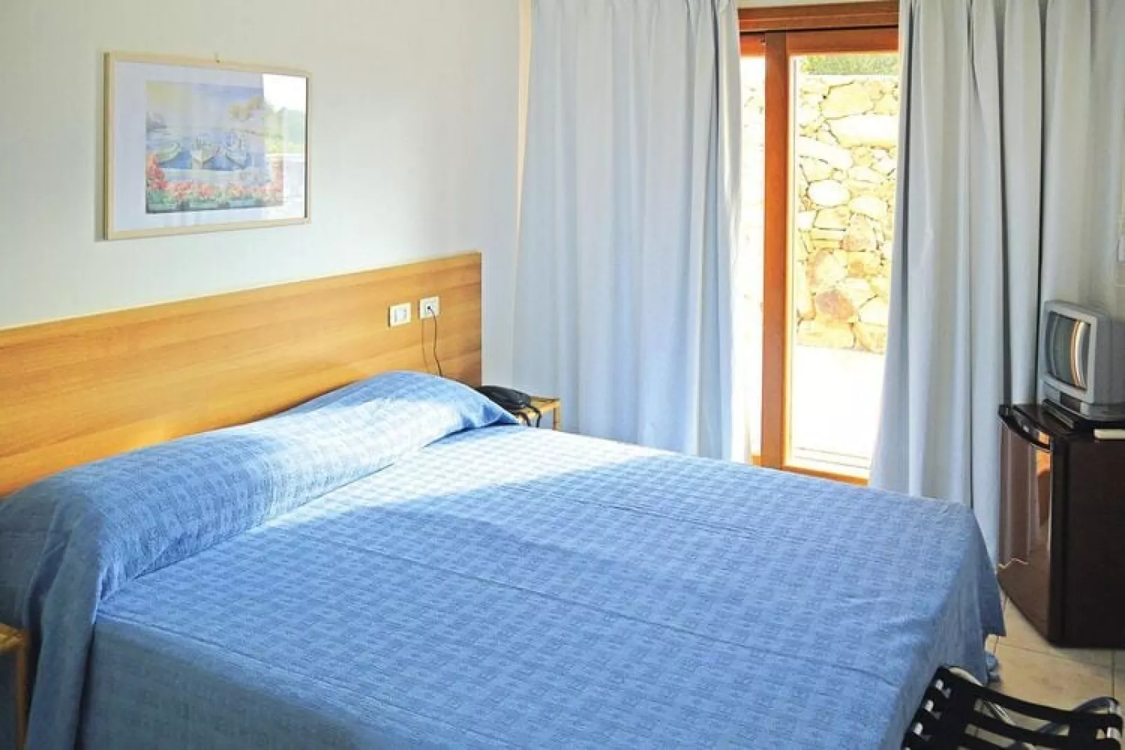 Holiday residence Il Nido dei Gabbiani Porto Pollo / Bilo Comfort 4 pax anche per disabile-Slaapkamer
