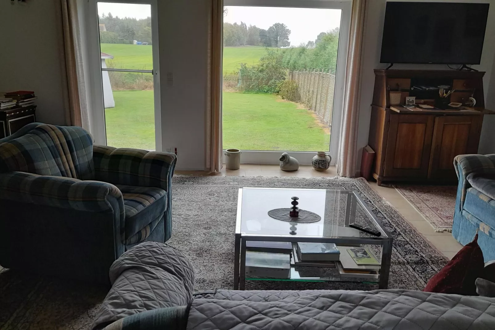 Ferienhaus am Peenebach in Klein Bünzow-Woonkamer