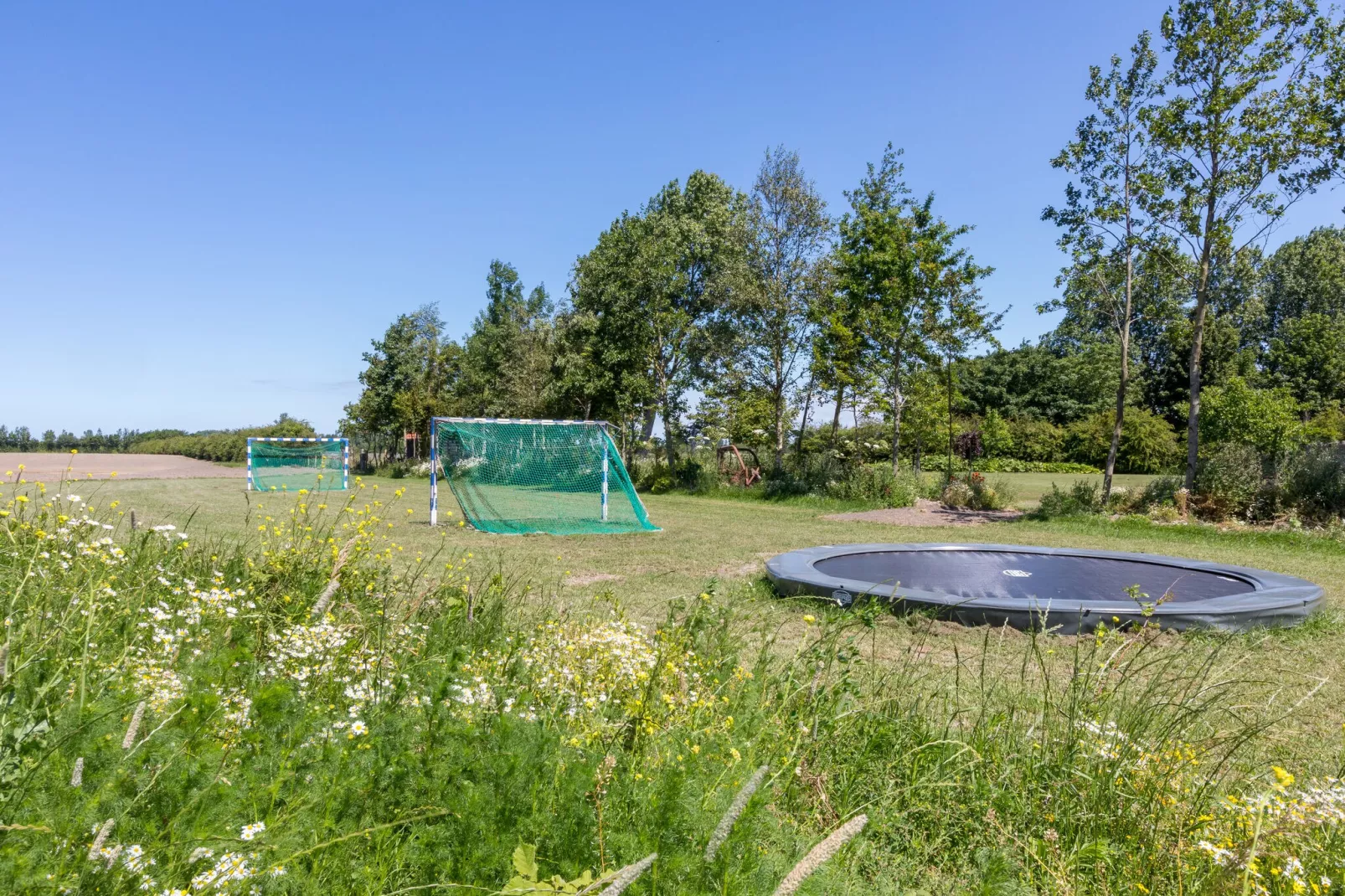 Familiehuis - Lepelstraat 18AB  Vrouwenpolder-Tuinen zomer