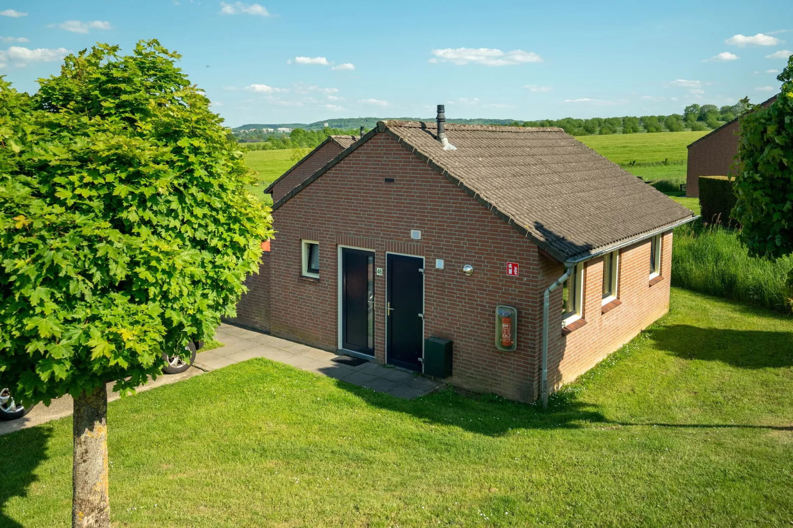 Vakantiepark Reevallis 2-Buitenkant zomer