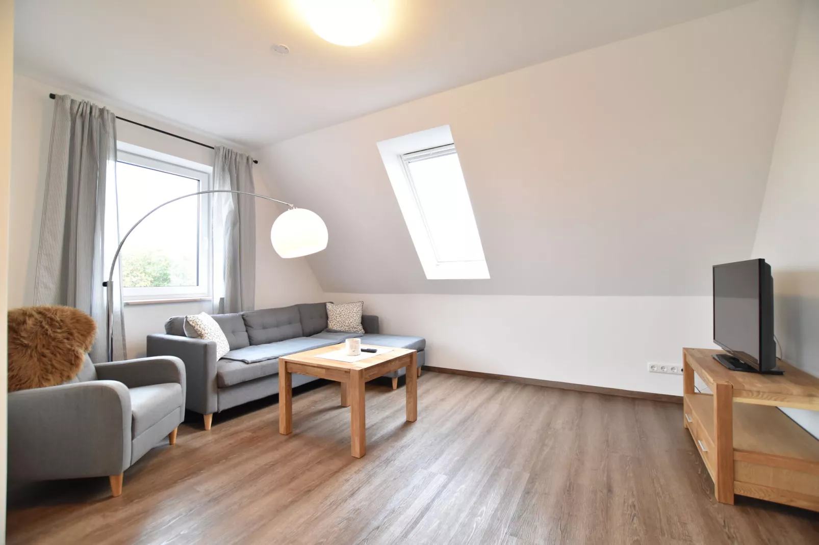 Ferienwohnung Gänseblümchen-Woonkamer