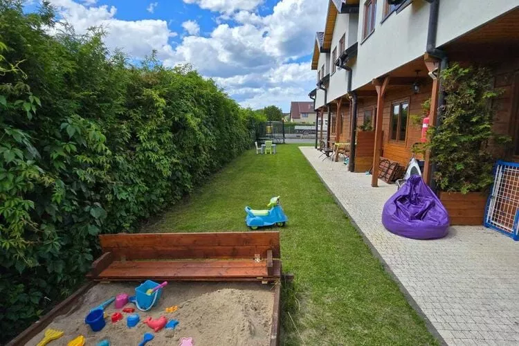 Domek wakacyjny PREMIUM dla 4 osób Sarbinowo-Tuinen zomer