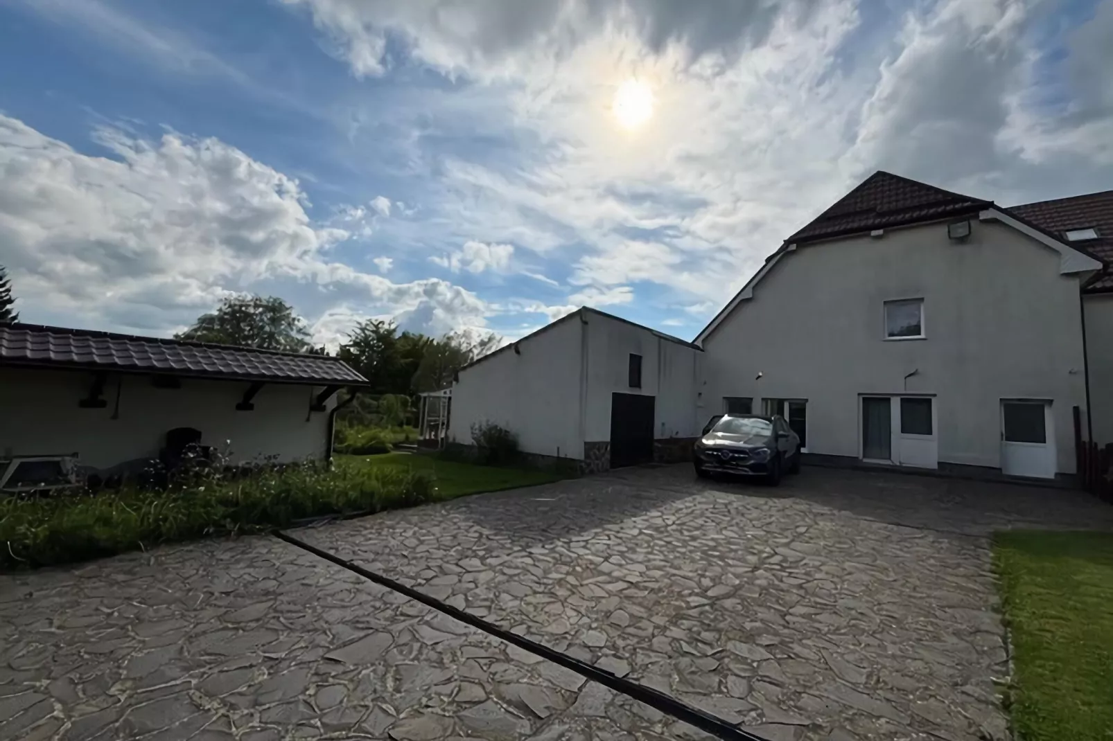 Le Domaine de l’Est-Buitenkant zomer