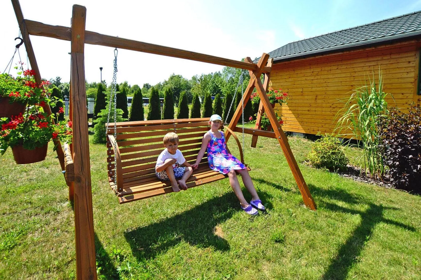 Domki letniskowe dla 5 osób Mielno-Tuinen zomer