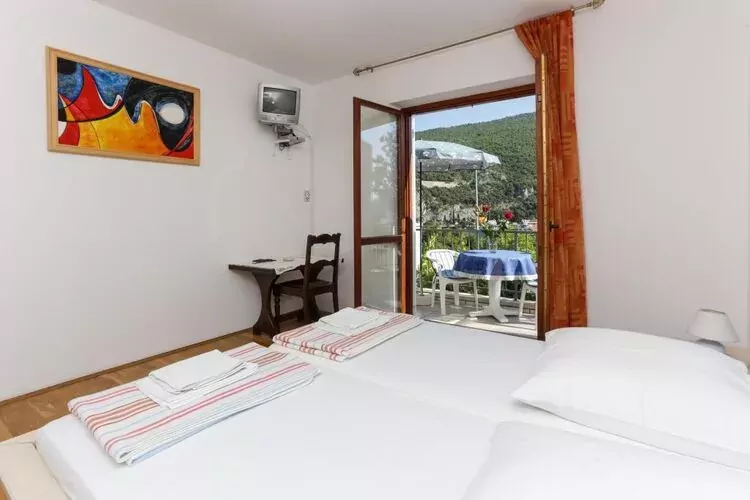 Villa Celenca - Double Room with Balcony and Sea View-Slaapkamer