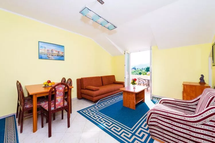 Apartments Azzurro- One Bedroom Apartment with Terrace and Hot Tub ( Azzurro II-gornji)-Woonkamer