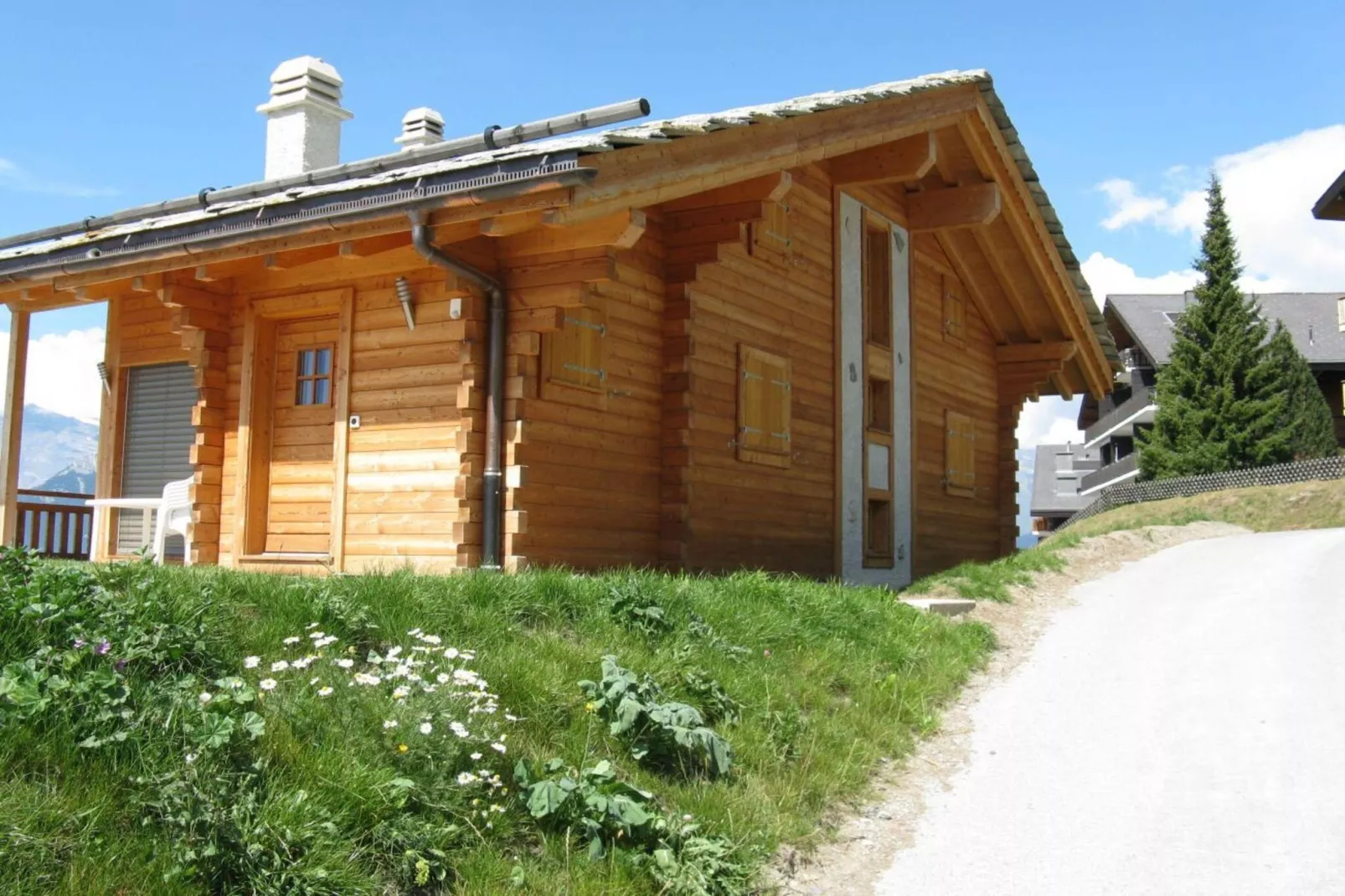 Christoph STANDING & CALM chalet 10 pers-Buitenkant zomer