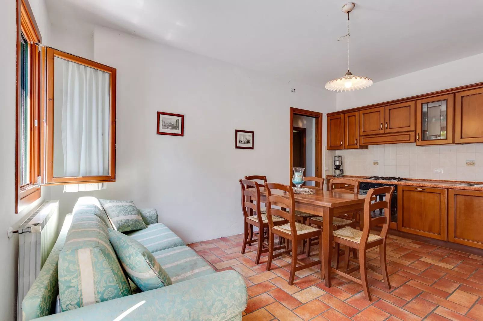 Leuk appartement op de begane grond in een vakantiehuis met zwembad aan de lagune van Venetië-Woonkamer