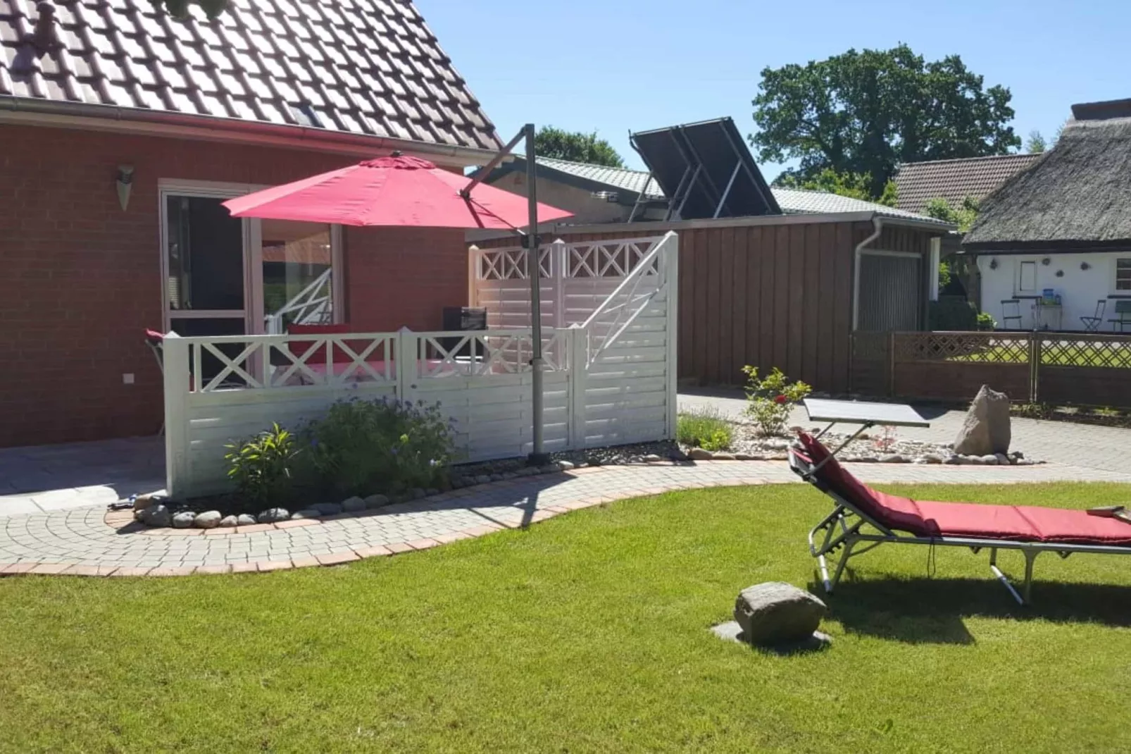 Ferienhaus Sternchen - Insel Rügen-Tuinen zomer