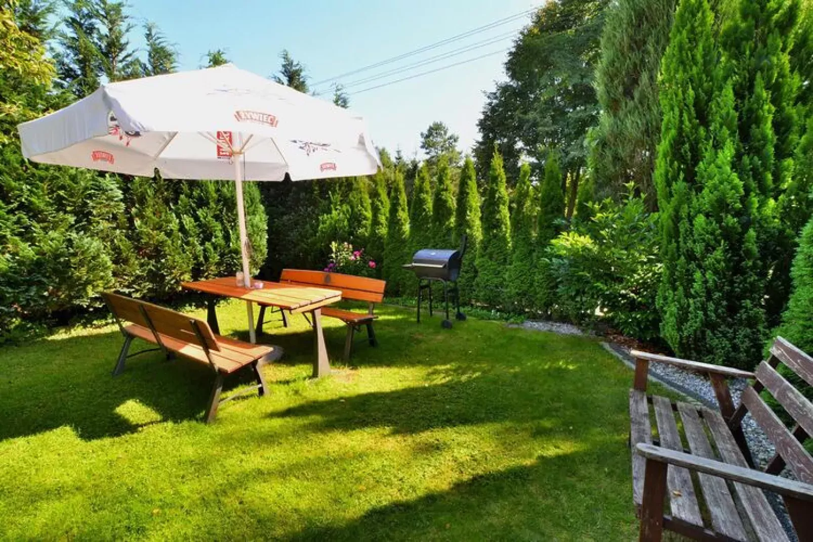 Piętrowe domki wakacyjne Kołobrzeg-Tuinen zomer
