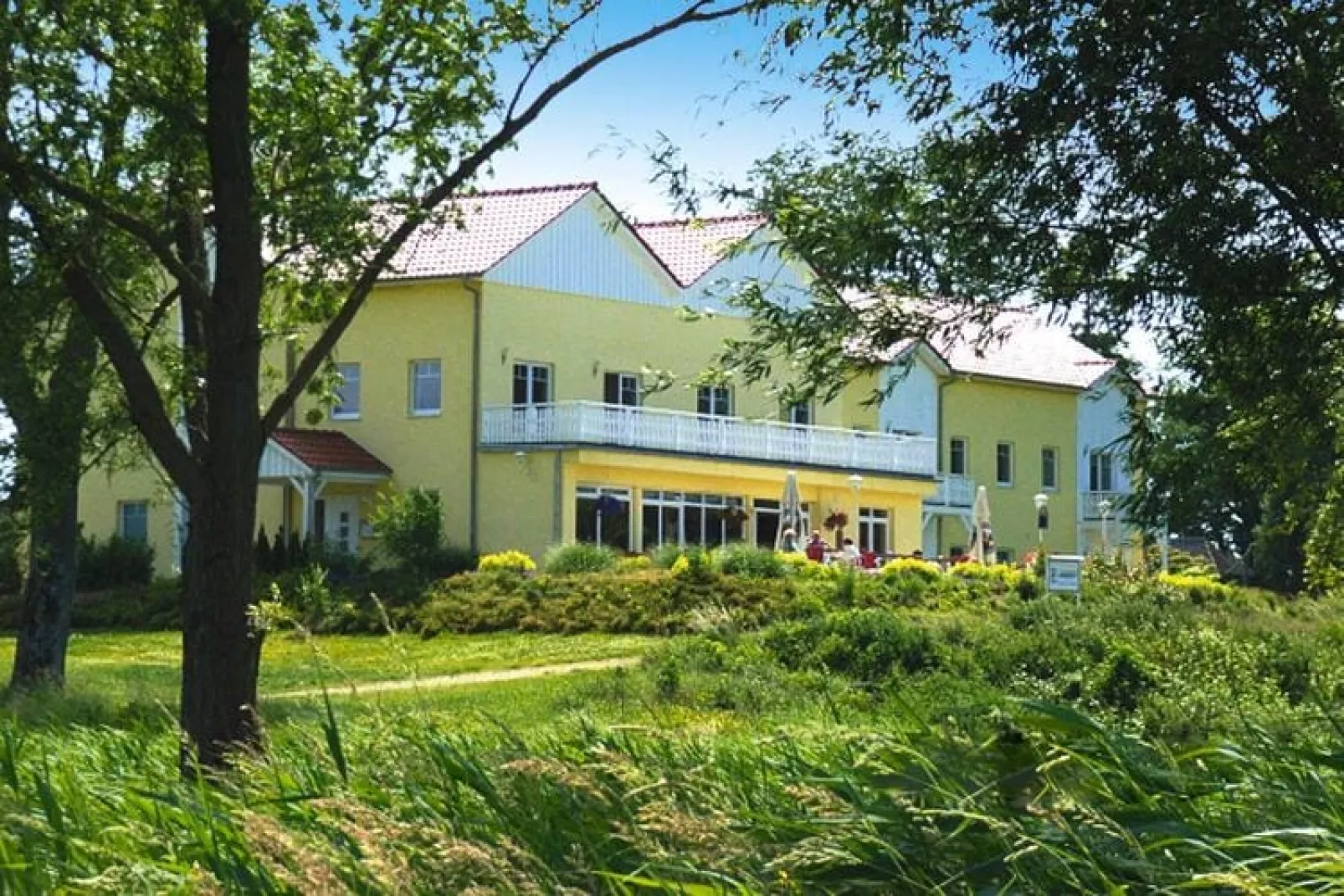 Wohnung 5 - 60 qm - Buitenkant zomer
