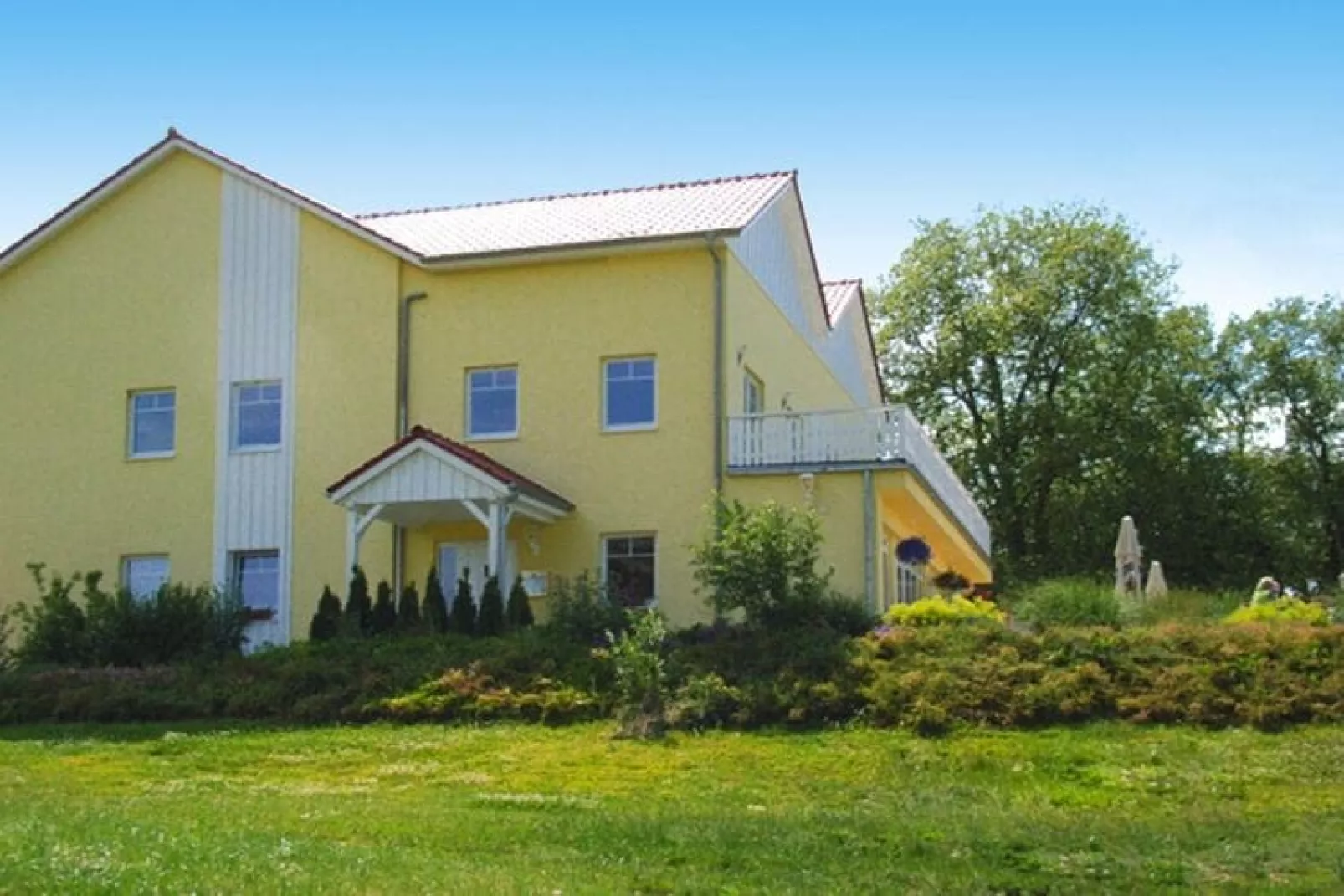 Wohnung 5 - 60 qm - Buitenkant zomer