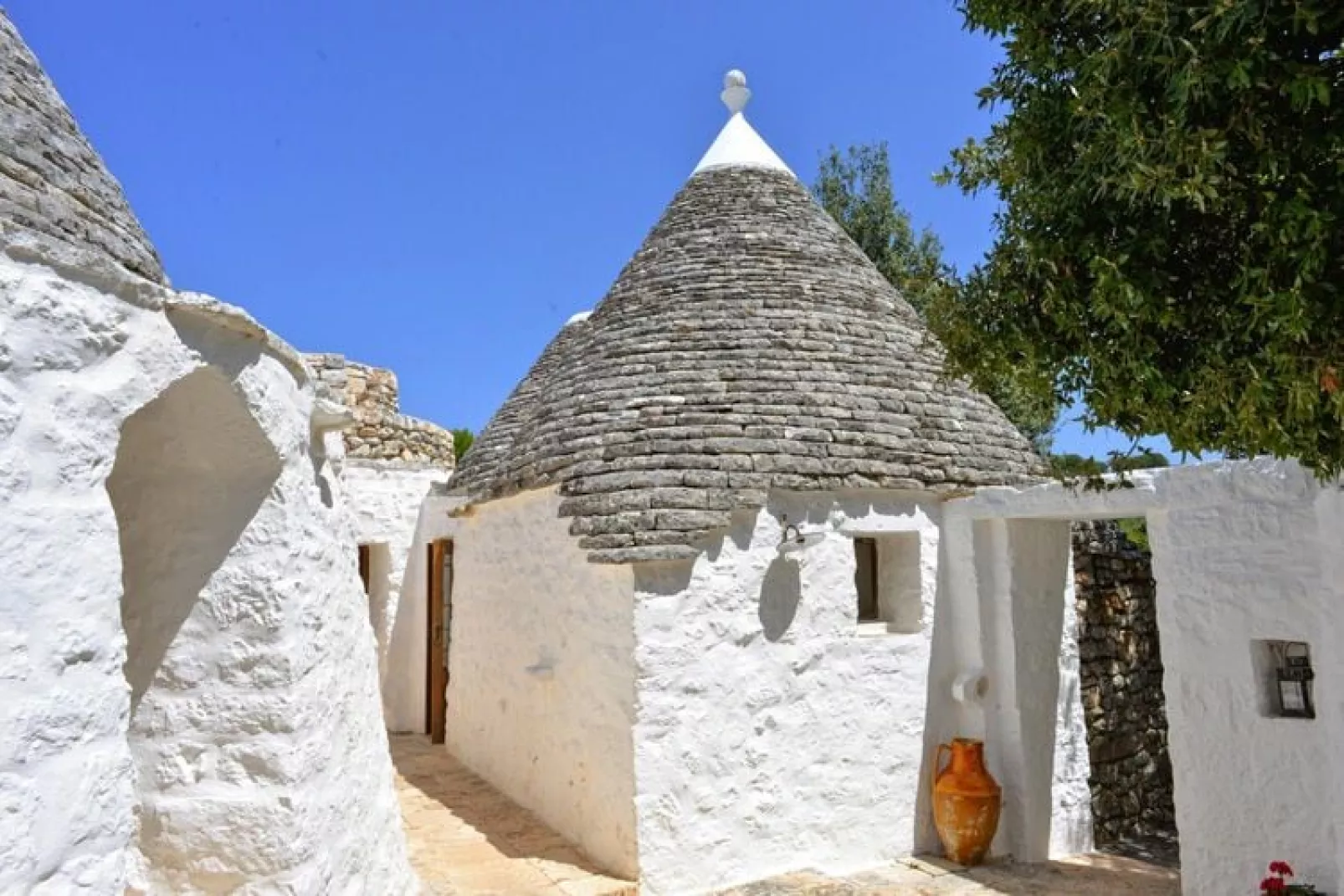 Trullo Cisternino - Type Trullo Francesco Fragnelli-Buitenkant zomer