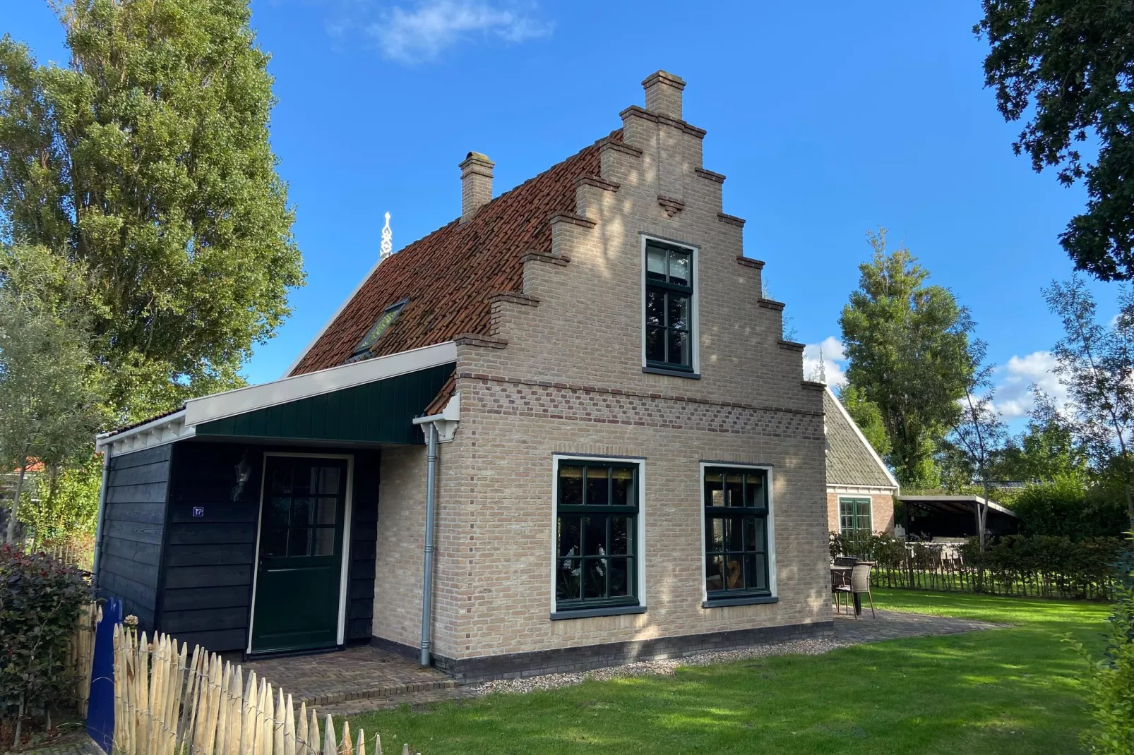 Recreatiepark Wiringherlant - Wiringher Villa 17-Buitenkant zomer