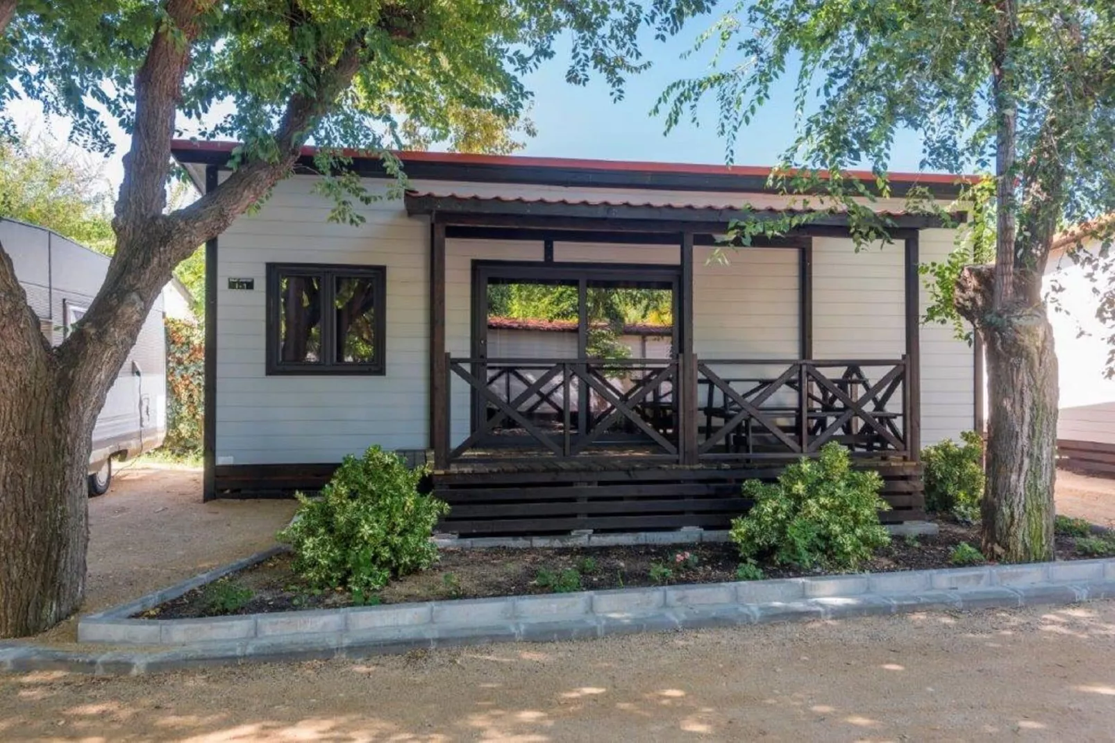 Camping Solmar - XALET CONFORT-Buitenkant zomer